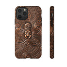 Woman holding Paa Guardian Tough iPhone Case - Hawaiian Copper Carved Tiki Polynesian Design - The Local Banyan
