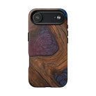 Woman holding Rooted MagSafe iPhone Case - Hawaiian Koa Wood Island Strength Tribal Design - The Local Banyan