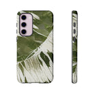 Woman holding Island Breeze Tough Samsung Galaxy Case - Hawaiian Palm Leaf Olive Green Botanical Design - The Local Banyan