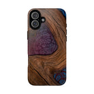 Woman holding Rooted MagSafe iPhone Case - Hawaiian Koa Wood Island Strength Tribal Design - The Local Banyan