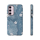 Woman holding Pua La Tough Samsung Galaxy Case - Hawaiian Golden Hibiscus Sun Flower Sapphire Design - The Local Banyan